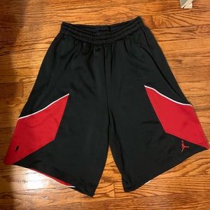 Two pairs of basketball shorts, Jordan and Adidas